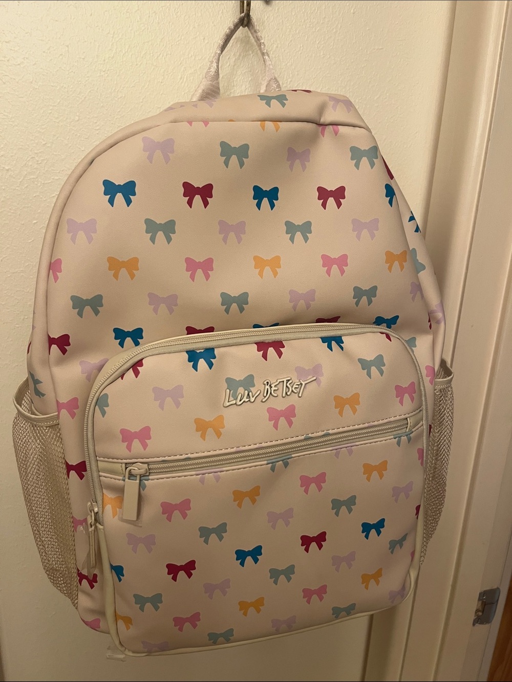 Betsey Johnson Cream Backpack with Multicolor Bow Print